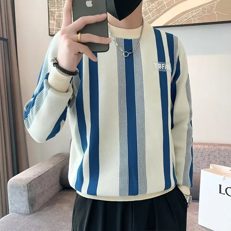 Blue and white contrast stripe long-sleeved pullover sweater, loose fit knitwear with V-neck.
