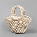 Hand-woven maple wood beach bag with wooden bead decoration in dumpling shape
