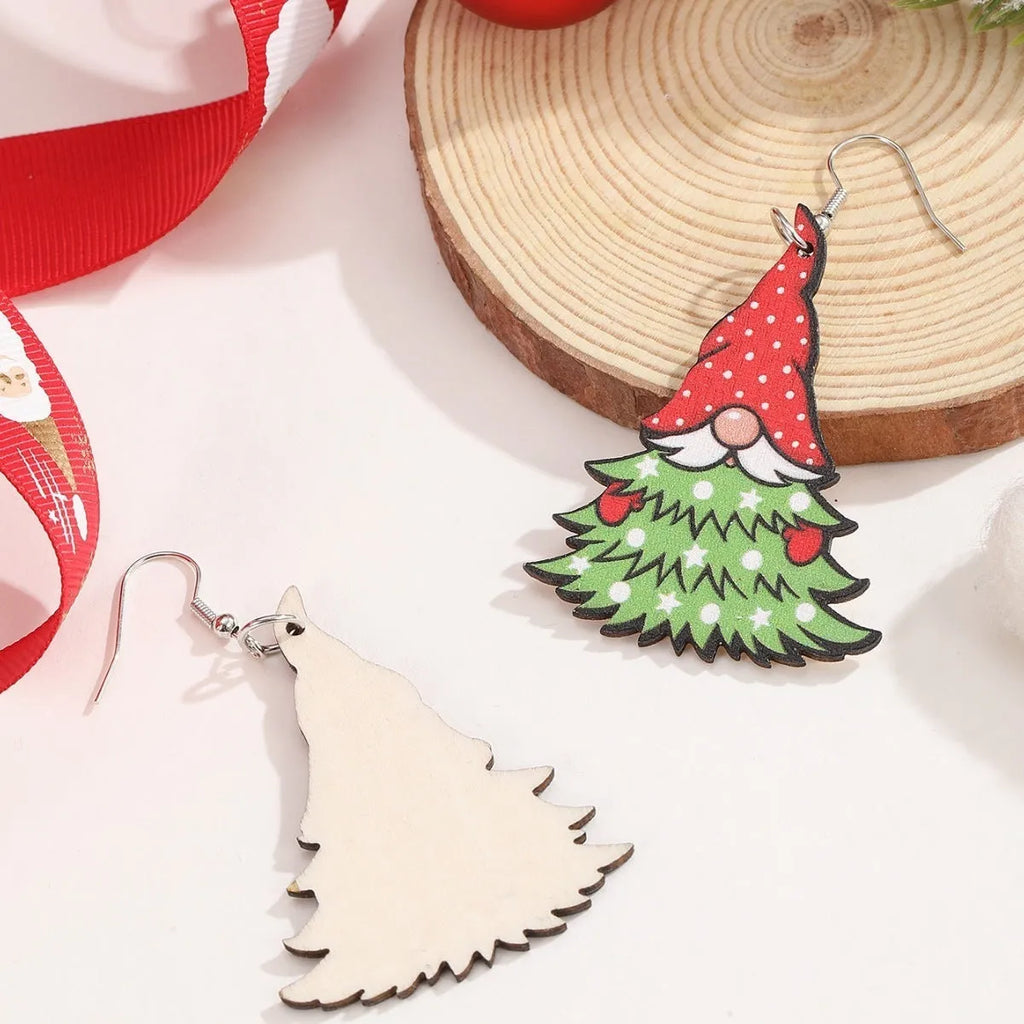 Wooden Christmas earrings with printed Santa Claus designs in geometric shapes
