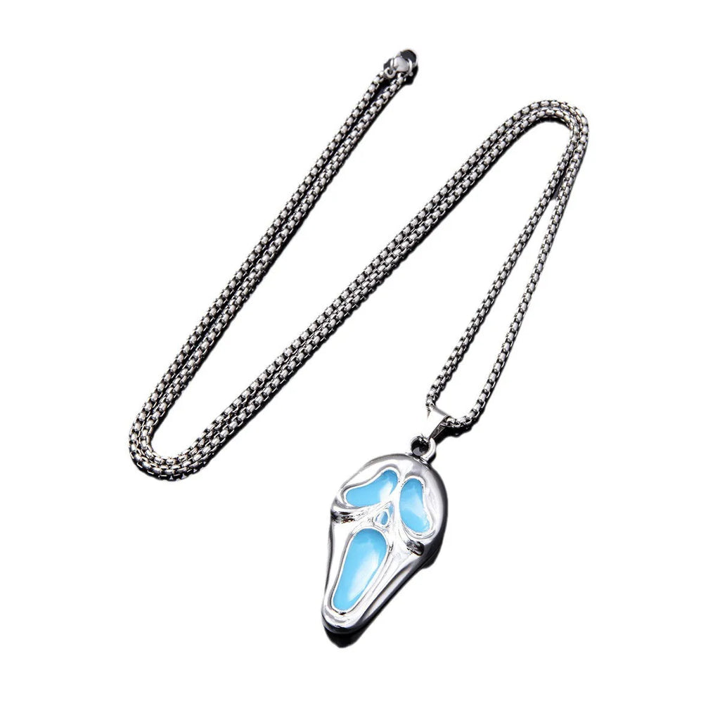 Exaggerated skull luminous mask pendant necklace on square pearl chain, available in luminous blue, luminous green, and hollow out colours