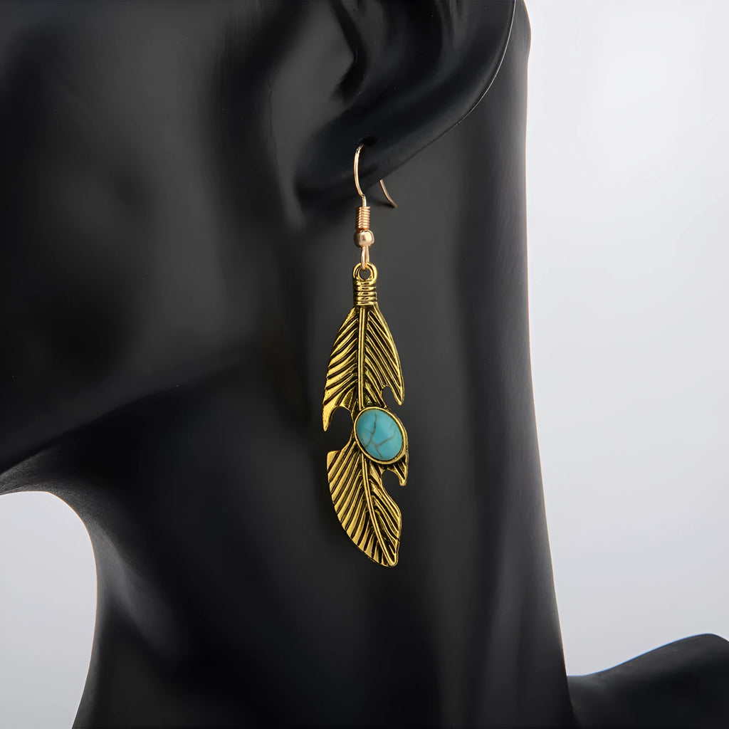 Vintage feather earrings with turquoise inlay leaf pattern in antique gold