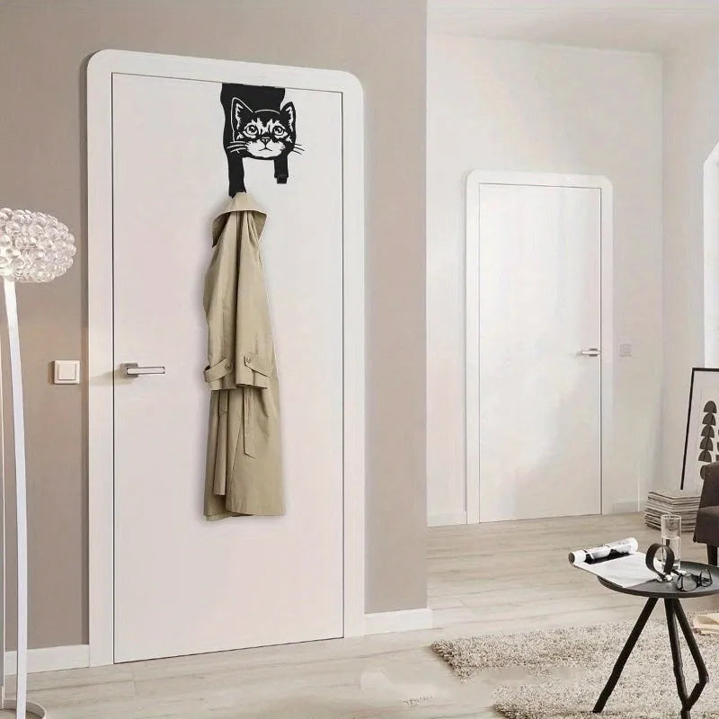 Black iron wall-mounted cat hook with modern design for punch-free installation.