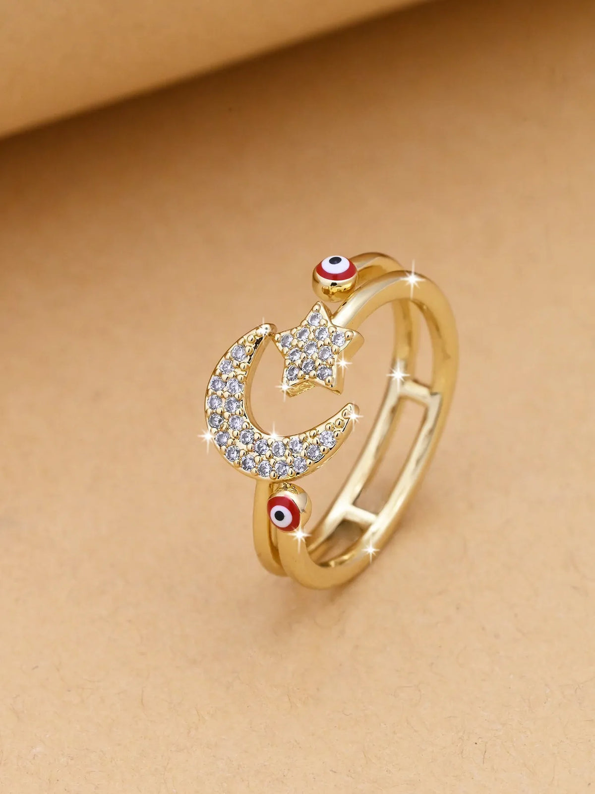 Devil's Eye open copper ring with electroplated finish, geometric eye design, shown in red, blue and white options