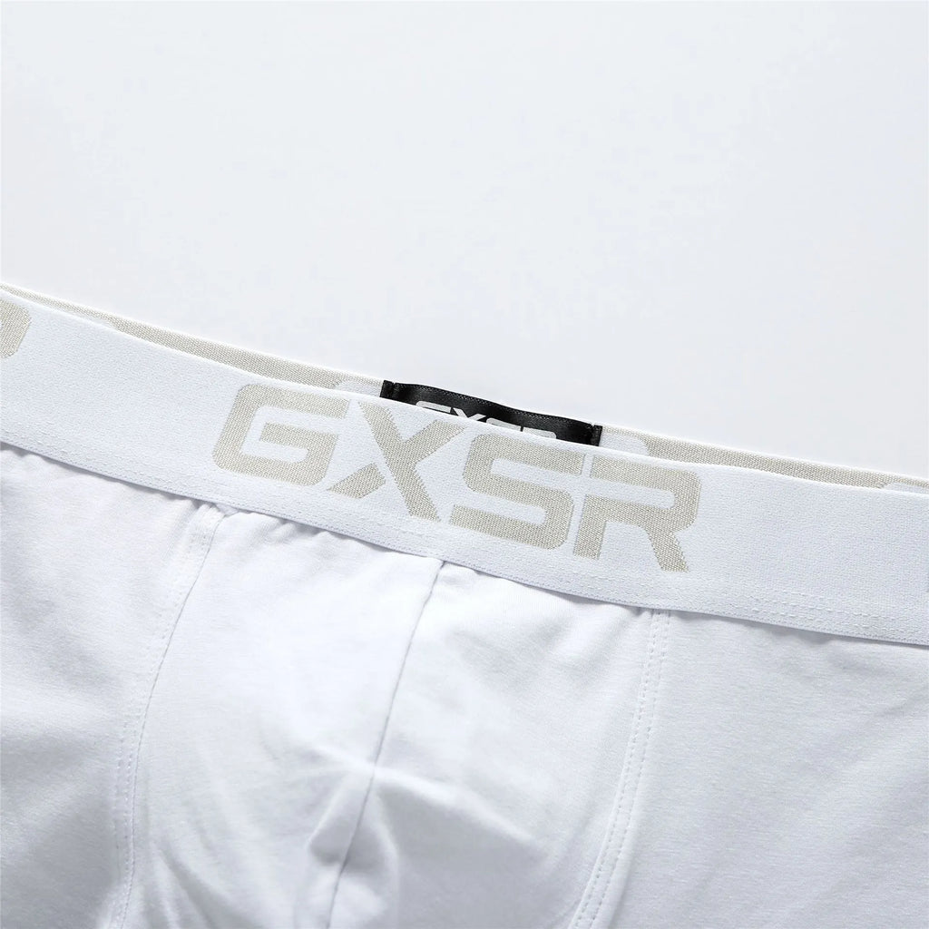 Men's purified cotton low waist boxer shorts in solid white, black, or grey, sizes M to XXL