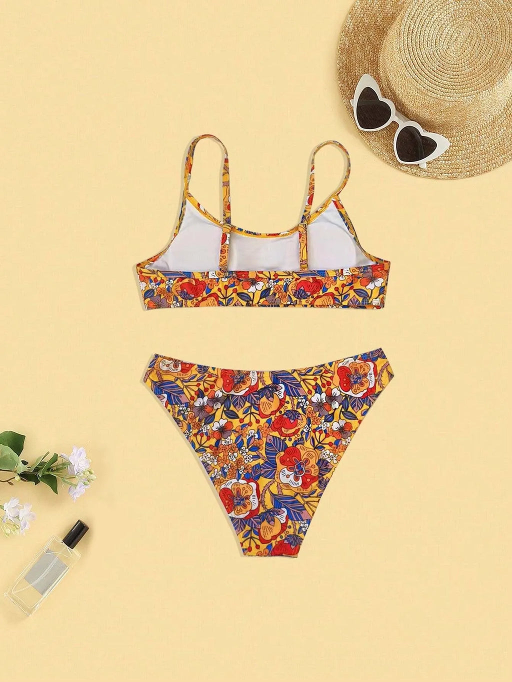 Women's plus size floral print bikini swimsuit with adjustable straps in briefs cut