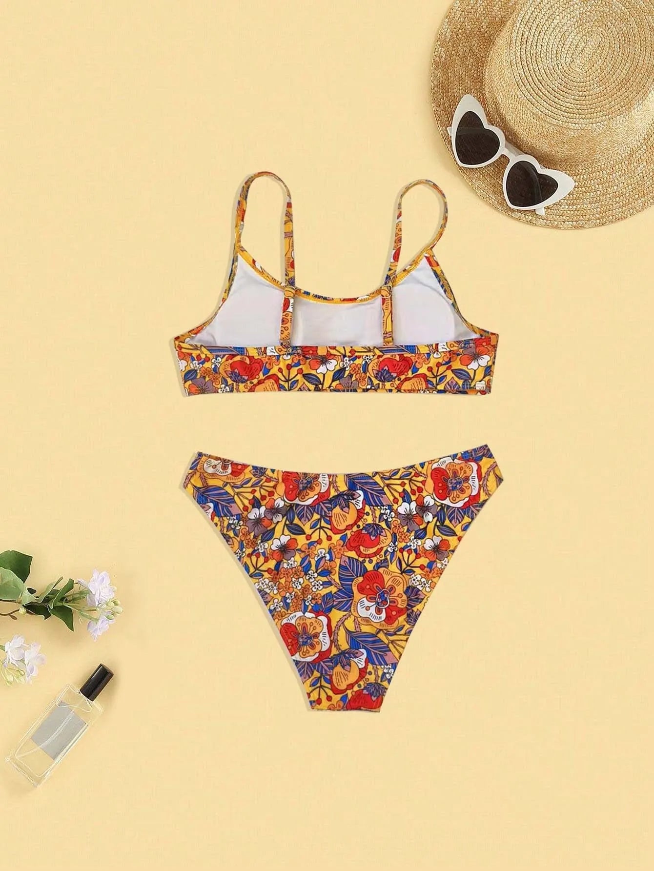 Women's plus size floral print bikini swimsuit with adjustable straps in briefs cut