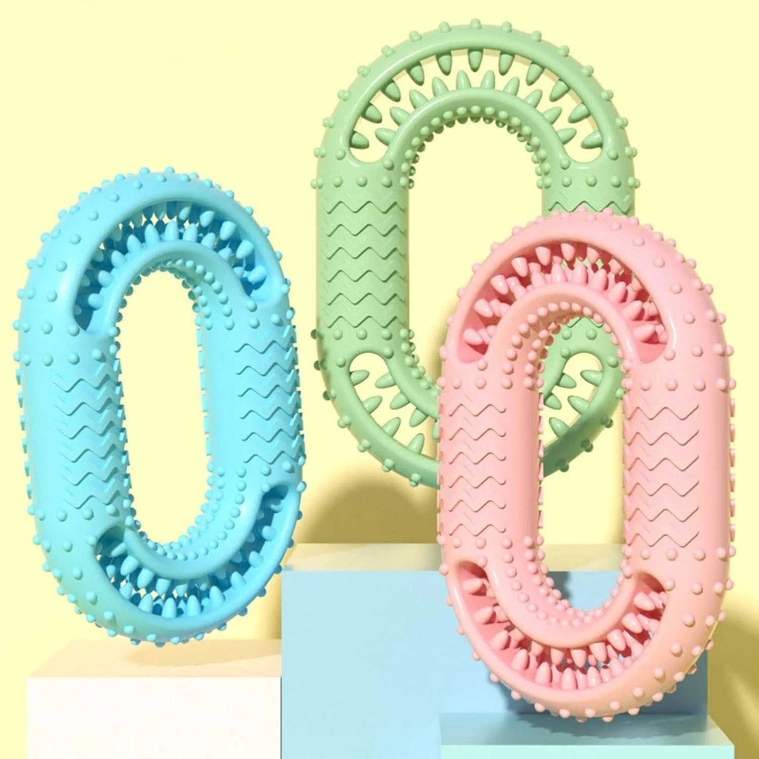 Blue O-ring shaped durable dog chew toy for aggressive chewers on a plain background.