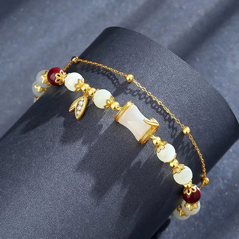 Retro bamboo design bracelet with flower shape and Ruyi elements in coloured glaze construction