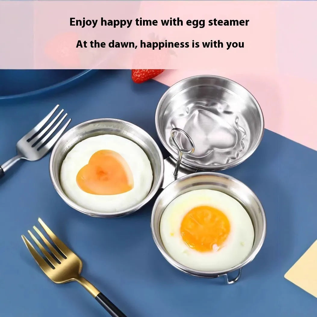 Mini stainless steel egg steamer shown in heart-shaped and round designs on a kitchen counter.
