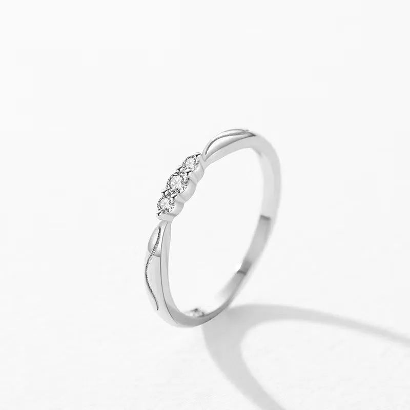 S925 sterling silver ripple wave gang drill ring on white background, white gold plating, US sizes 6-9