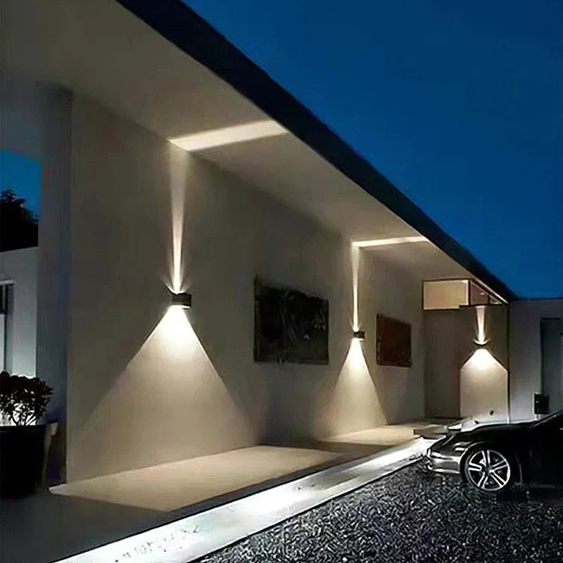 Black outdoor waterproof wall lamp with aluminium body, 6W warm LED light and adjustable angle