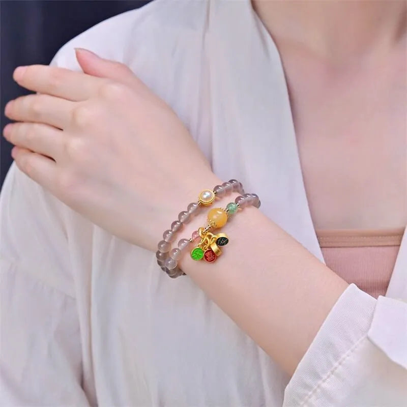 Natural gray agate bracelet with two-circle design on wrist