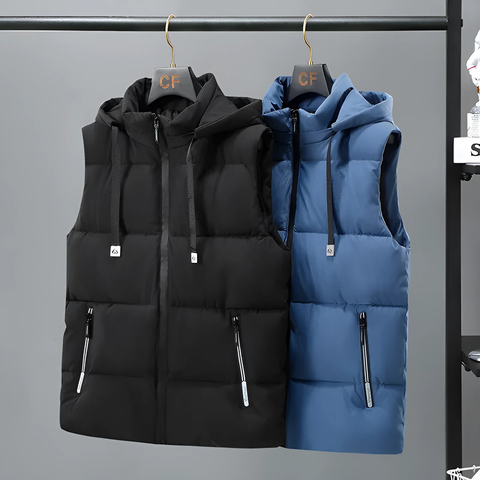 Men's black polyester vest with removable cap showing straight hem design and slant pockets