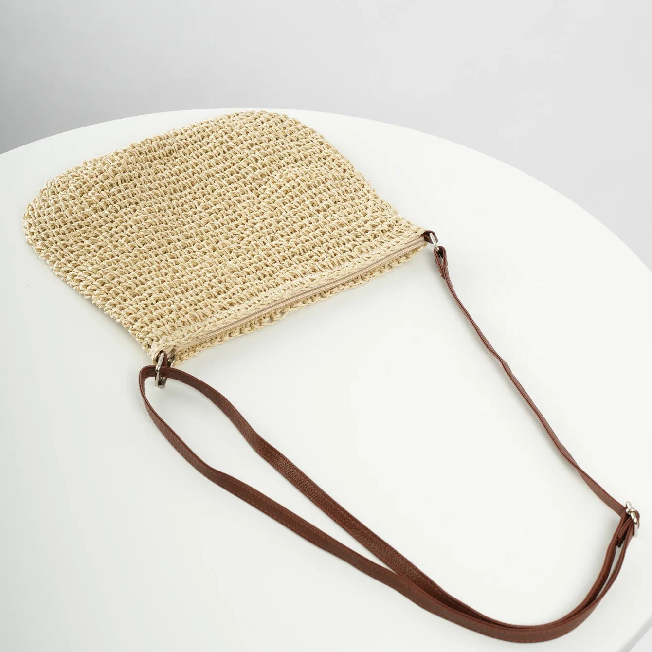 Niche design medium straw tote bag in beige with zipper closure, horizontal square shape, woven material