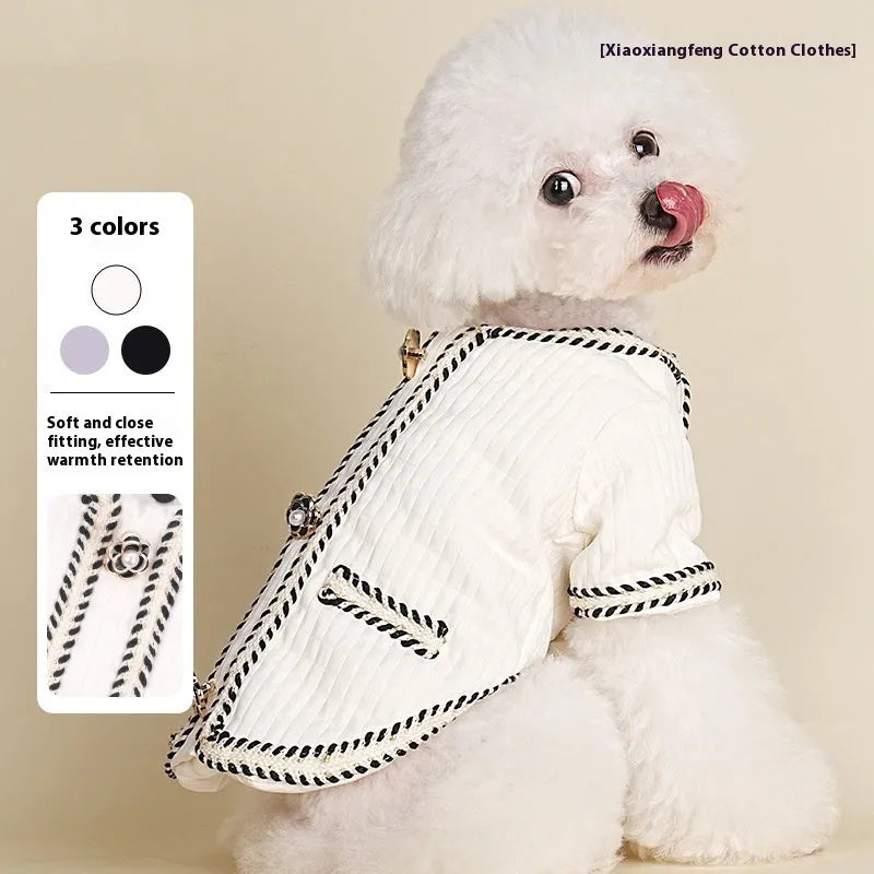 Dog wearing quilted polyester coat in cartoon style design available in three colours