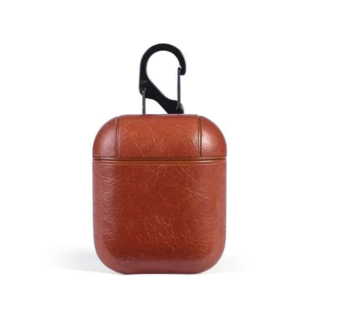 Genuine leather protective case for Apple AirPods charging case in black, brown, light brown, and red.