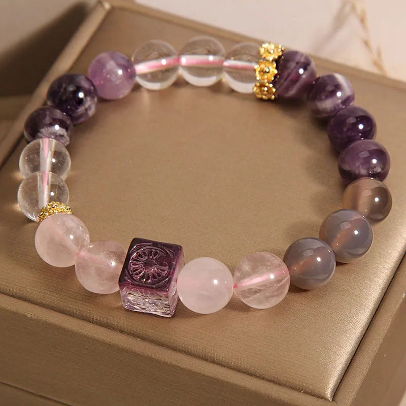 Close-up of a women's purple crystal amethyst bracelet with rhinestones, showing its 10mm size.