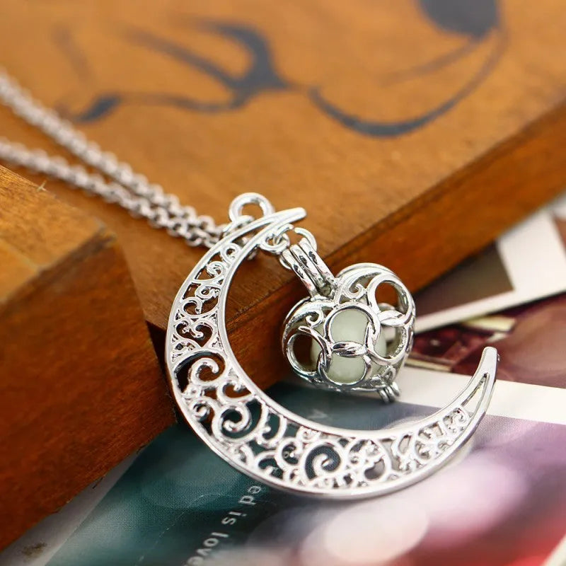 Glowing pendant necklace with silver plated chain, 50 cm length, luminescent pendant in white K plating