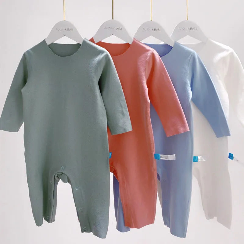 Baby pajama climbing suit in 100% polyester with blue colour, footed Siamese style, on white background