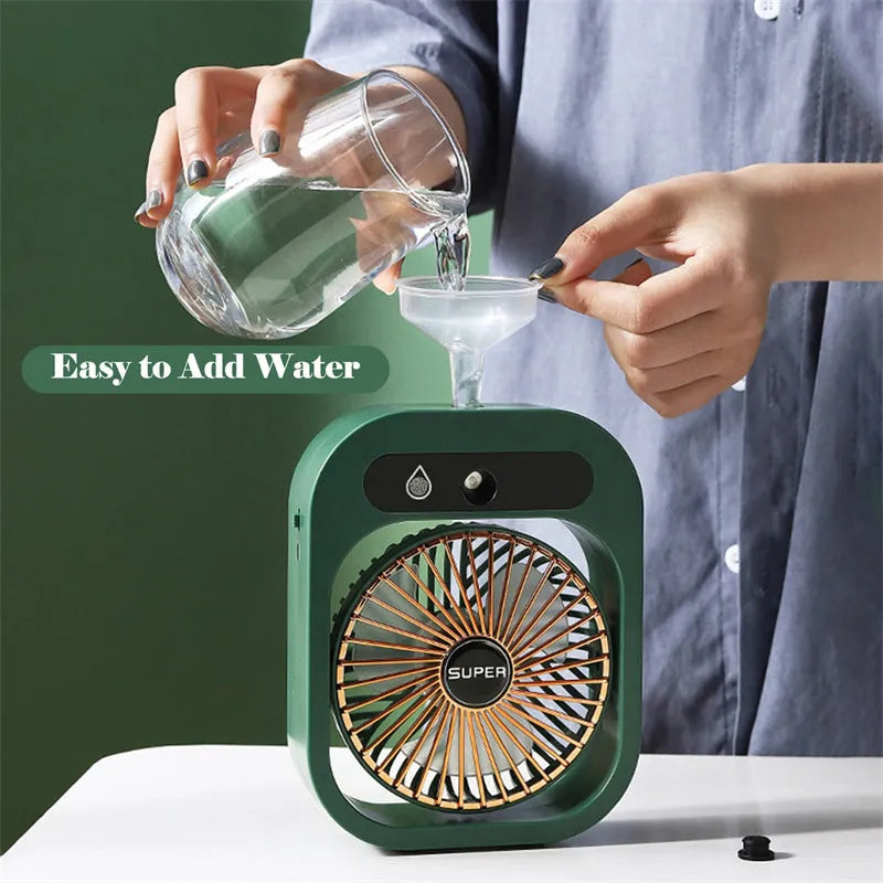 Green and white USB portable misting fan with humidifier function on desk