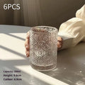 A solid colour Begonia carved glass water cup showing short 250ml and tall 360ml size options.