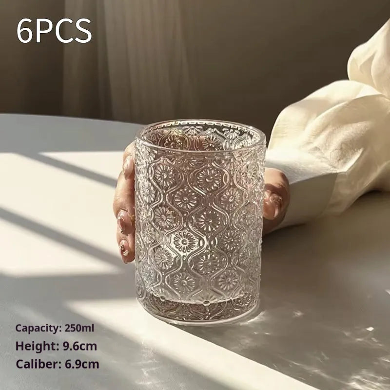 A solid colour Begonia carved glass water cup showing short 250ml and tall 360ml size options.