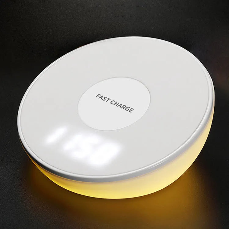 White smart wireless charger with digital clock display and three control buttons.