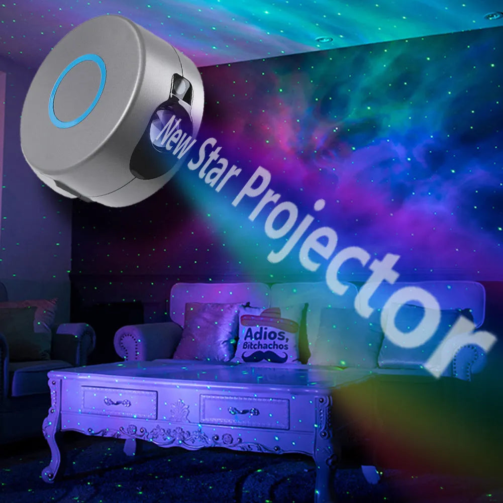 Grey starry sky projection lamp with remote control on a table, projecting light onto a ceiling.