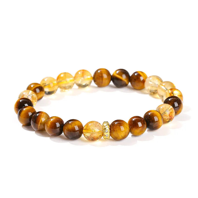 Yellow tiger-eye gemstone bracelet with 8mm round beads in a Jinba geometry design.