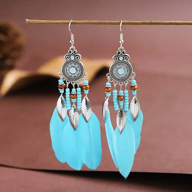 Feather-shaped alloy drop earrings with leaf patterns in electroplated colours for bohemian style