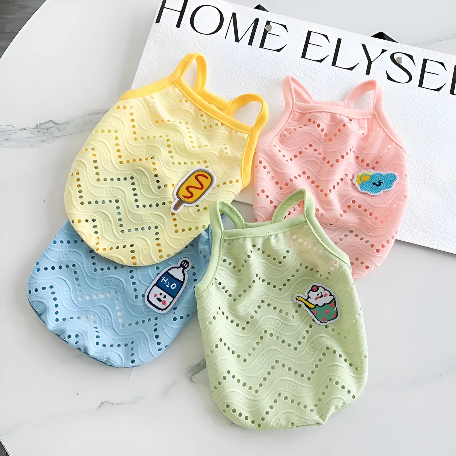 Light blue mesh dog vest with adjustable straps on a mannequin, showing breathable fabric.