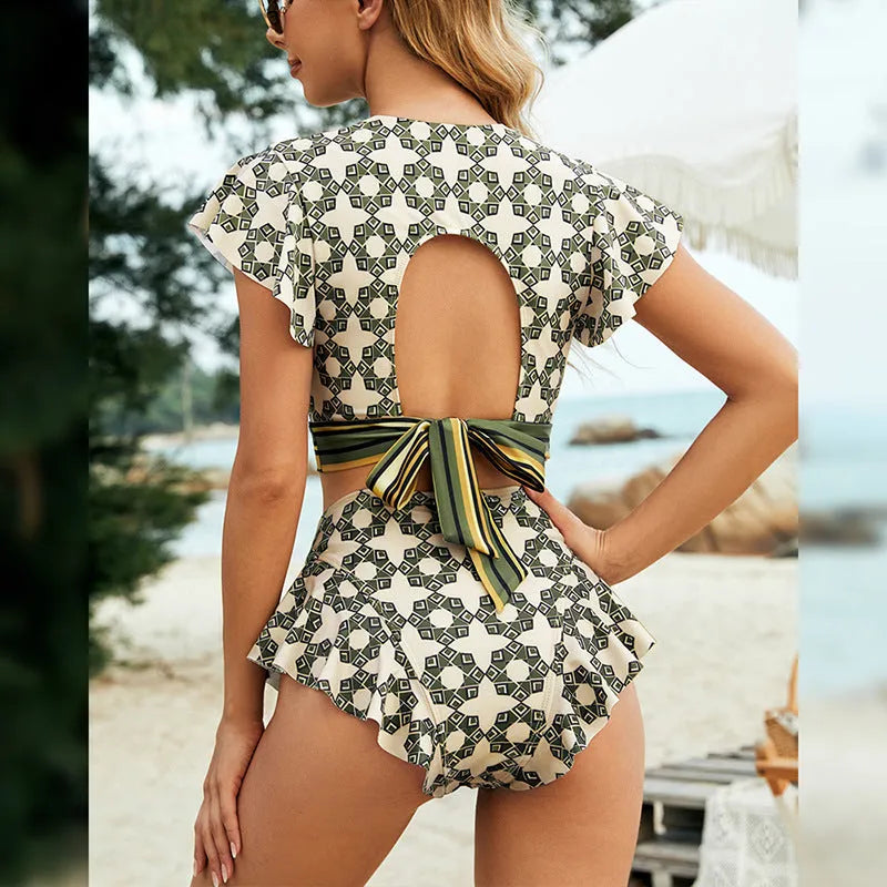 Green flounced backless bikini swimsuit with lace-up V-neck styling