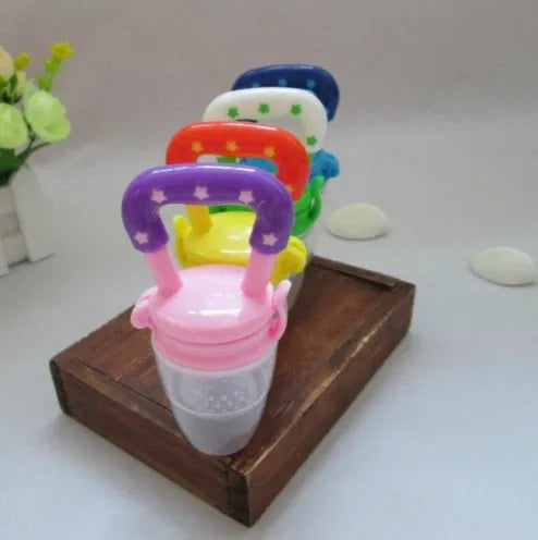 New baby silicone pacifier encapsulated food feeder in size M with blue silicone nipple