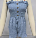 Solid colour off-shoulder sleeveless women's jumpsuit on a hanger, showing button detail and mid-waist design.