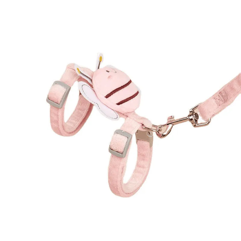 Pink adjustable cat harness with bee-shaped back and matching hand-held leash.