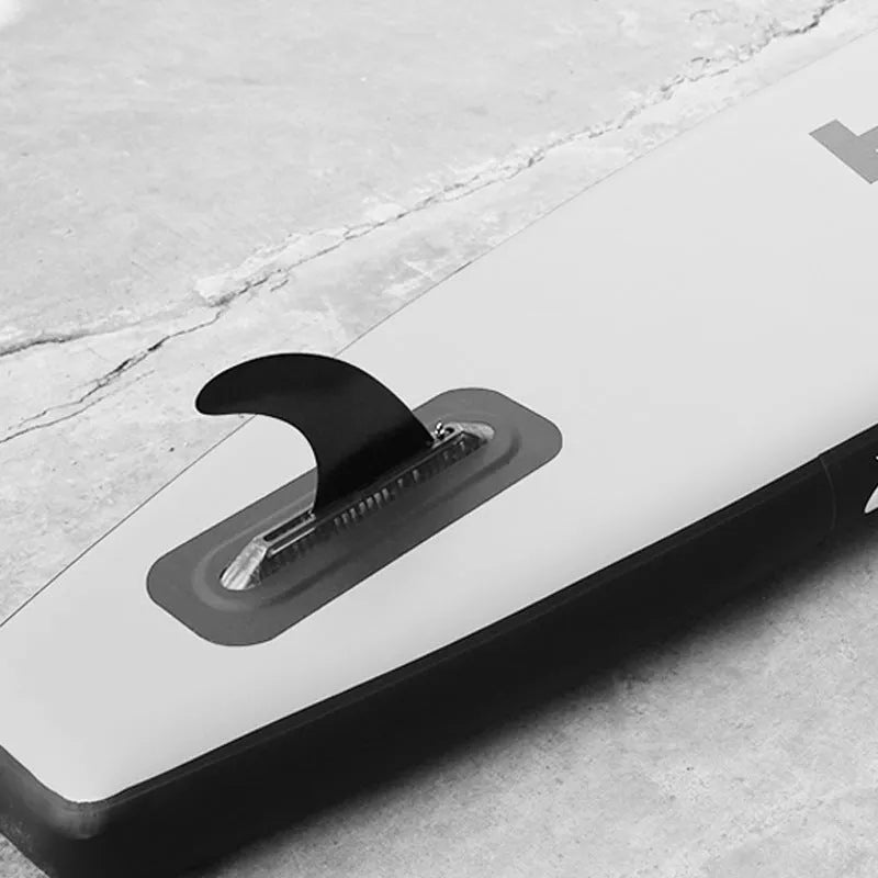 SUP paddle with removable plastic fish fins on the blade, model YQ310.