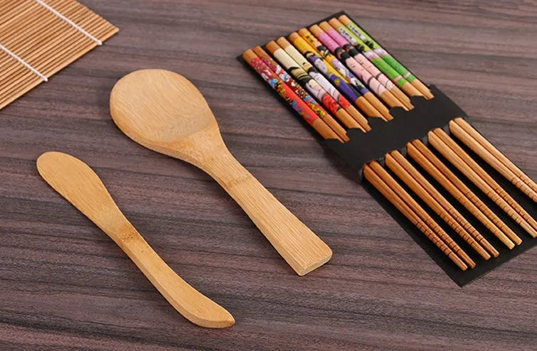 Sushi tool set with bamboo rolling mat and white plastic rice paddle for home sushi making