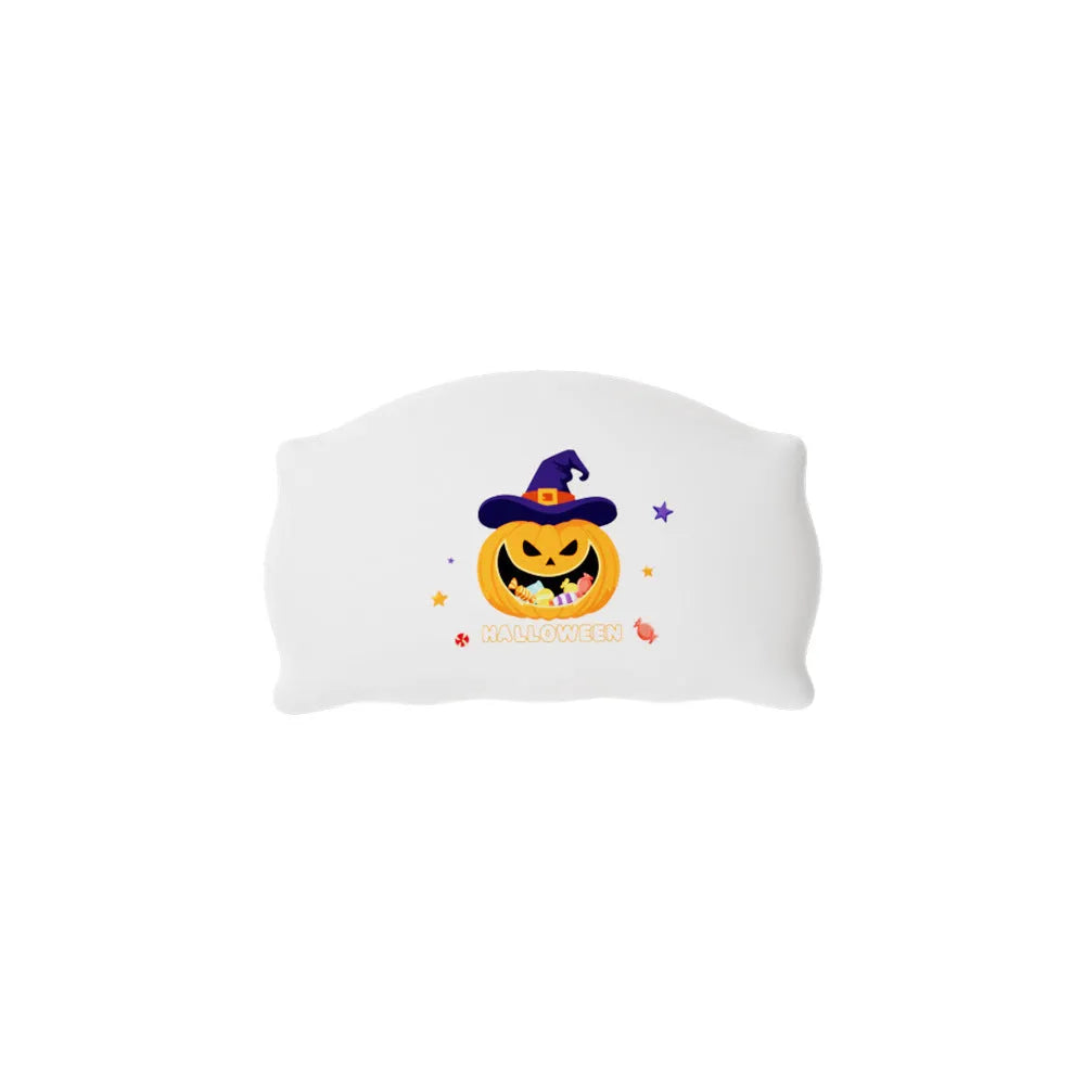 Cartoon Halloween ghost doll table lamp with warm LED light on a bedside table.