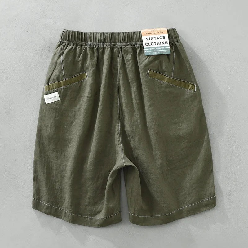 Men's linen shorts in straight drooping style with drawstring waist in black or green colour