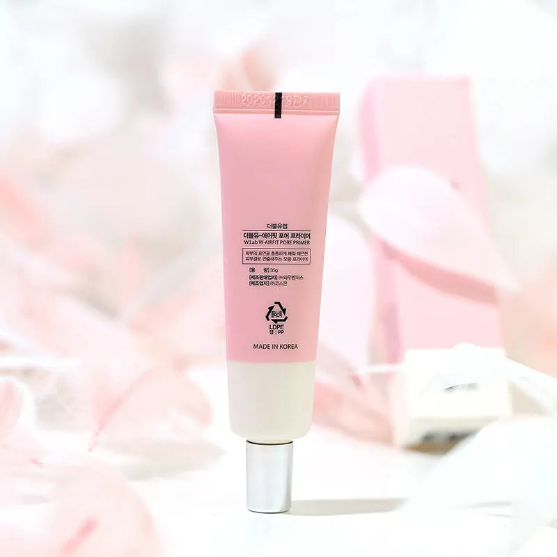 Pink cream before makeup face primer in tube packaging, brightening skin tone and creating invisible pores.