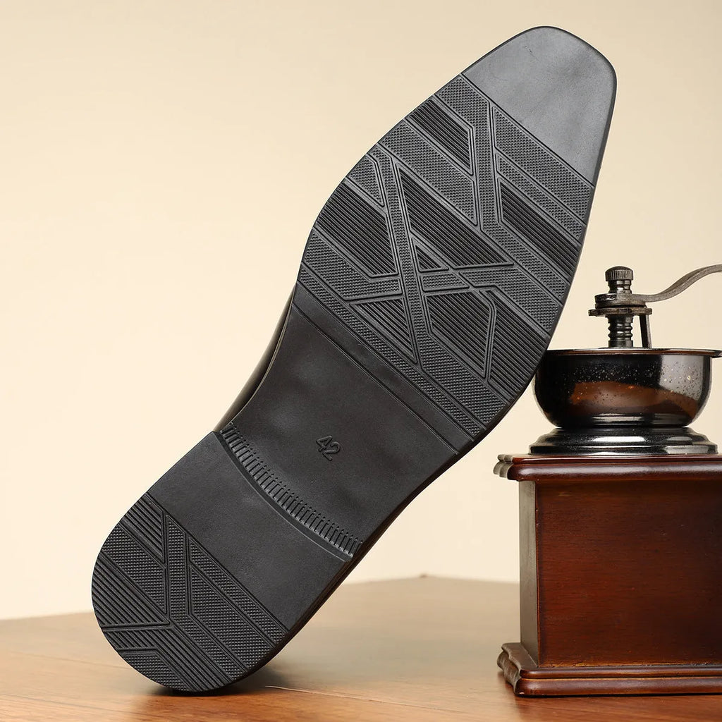 Men's brown retro business shoe with side zipper and square toe on a plain background.