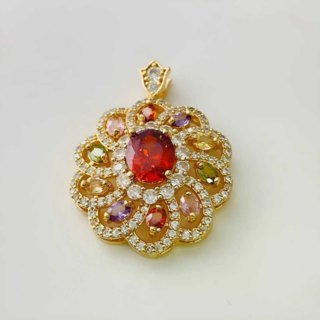 Close-up of a women's floral-shaped colourful zircon pendant necklace in a gold metal setting.