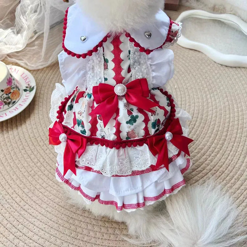 Small white dog wearing a light pink rabbit skirt princess-style polyester dress.