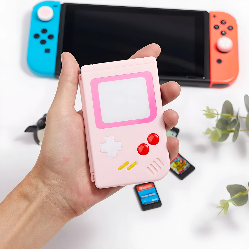 Nintendo Switch game card storage box in blue, pink or white, showing compact size