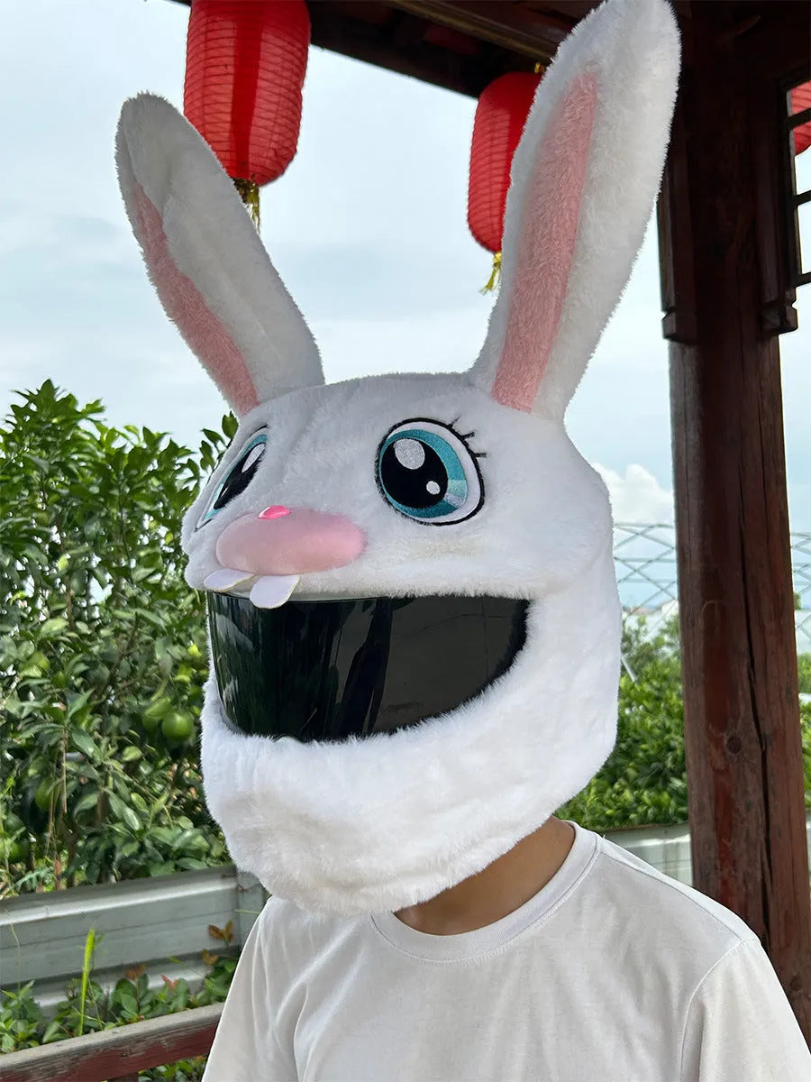 White decorative rabbit head cover for an electric motorcycle helmet with long ears and plush lining.
