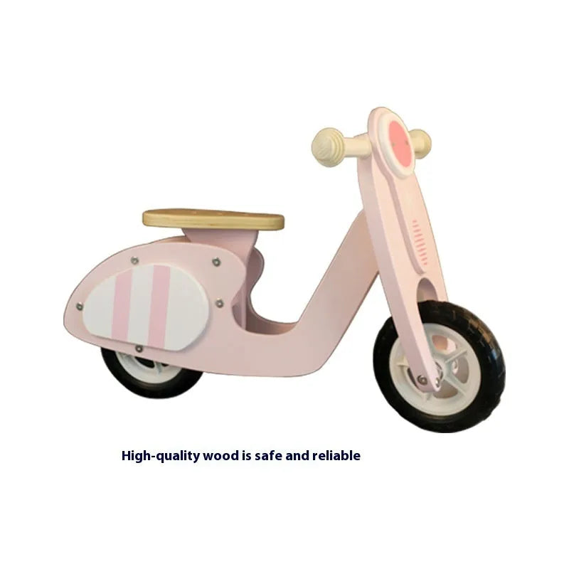 Pink wooden toddler balance scooter with 10-inch wheels for children aged 1-6.