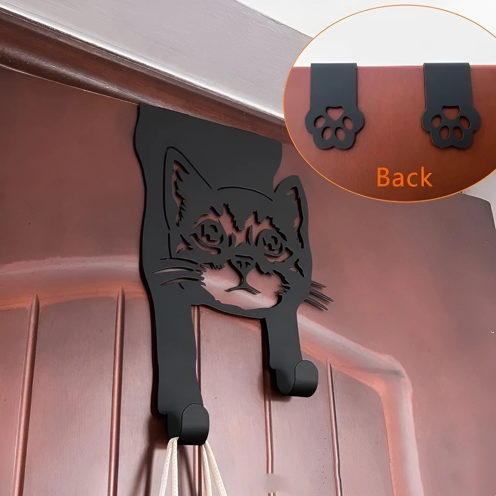 Black iron wall-mounted cat hook with modern design for punch-free installation.