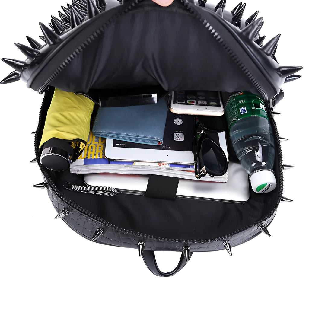 Women's punk rock backpack with hollow-out design in black colour showing shoulder straps and zipper closure