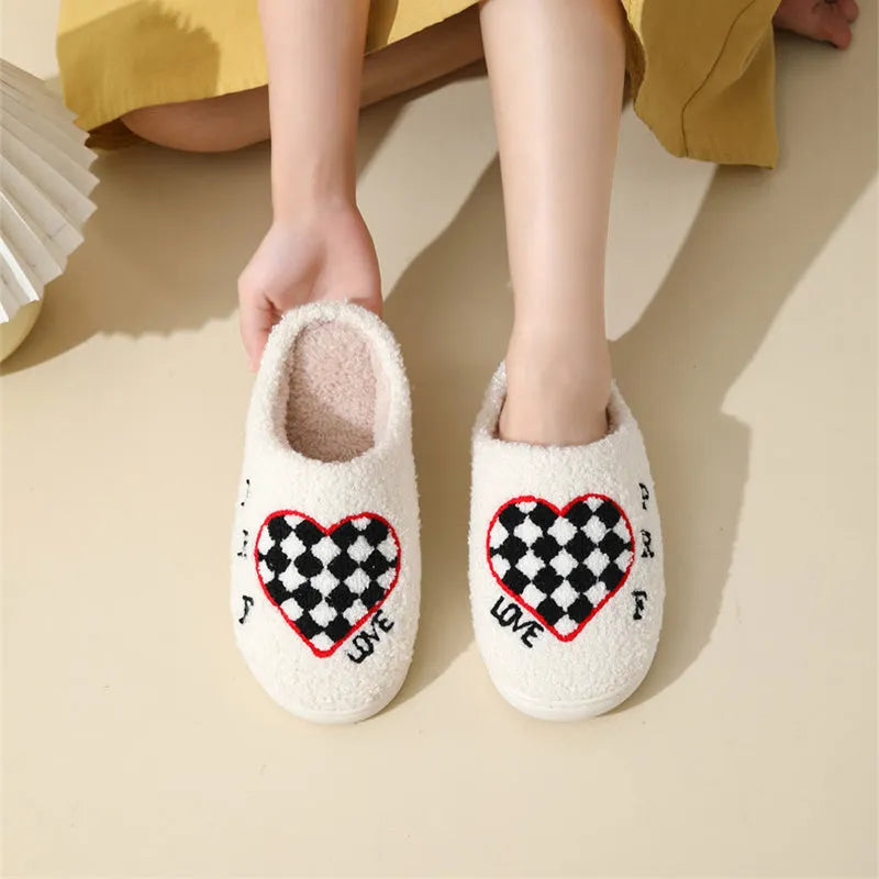 Pair of Halloween cartoon indoor slippers with spider pattern suede upper and PVC sole