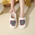 Pair of Halloween cartoon indoor slippers with spider pattern suede upper and PVC sole